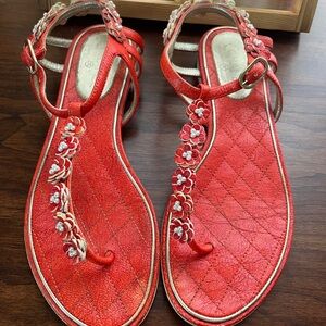 CHANEL Red Sandals with Metallic Accents